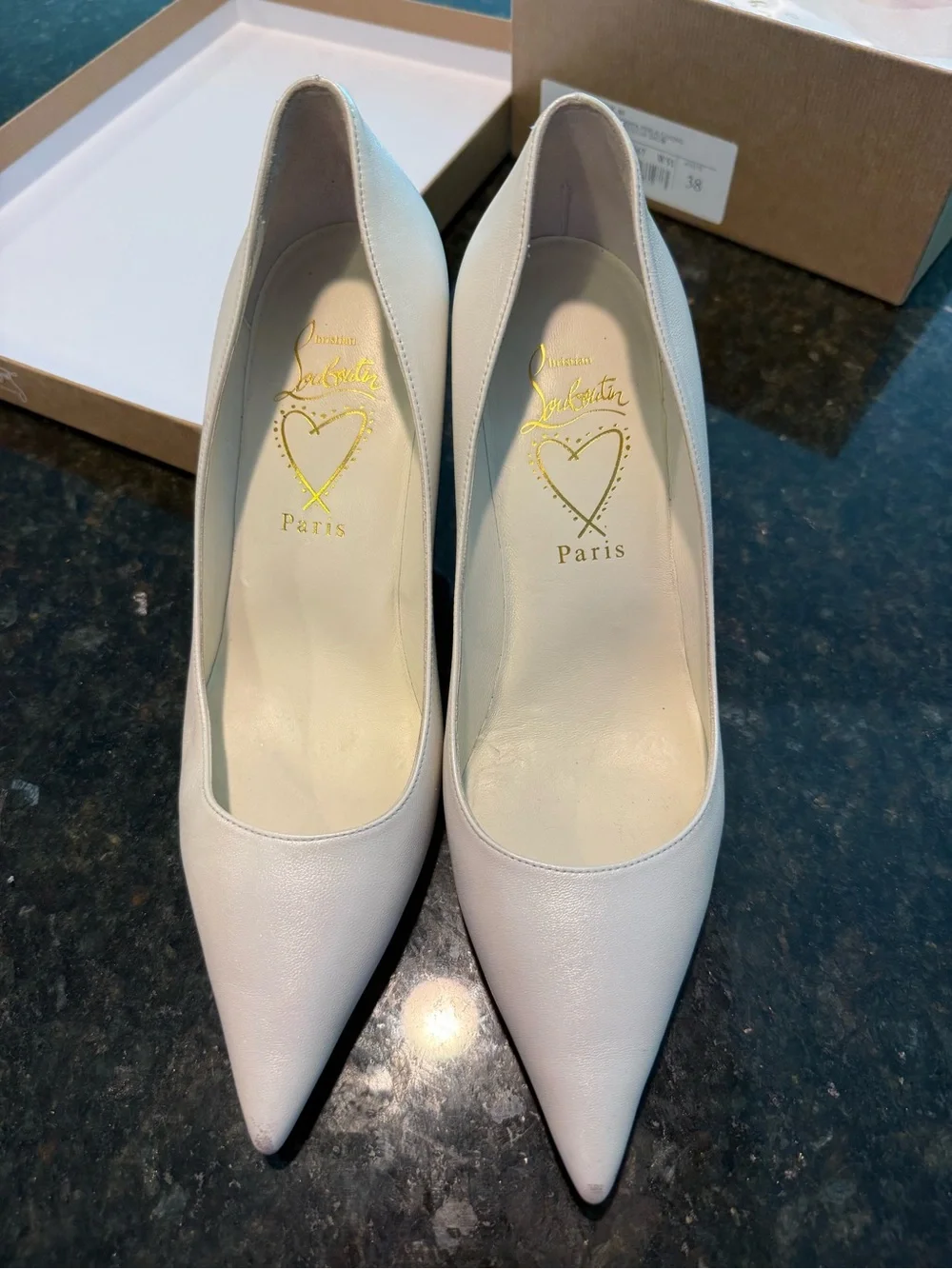 Christian Louboutin White Pointed-Toe Pump with Signature Red Sole